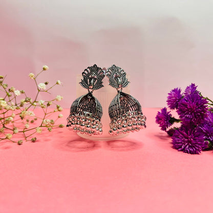 Oxidized Silver Jhumka Earrings with Lotus and Peacock Design